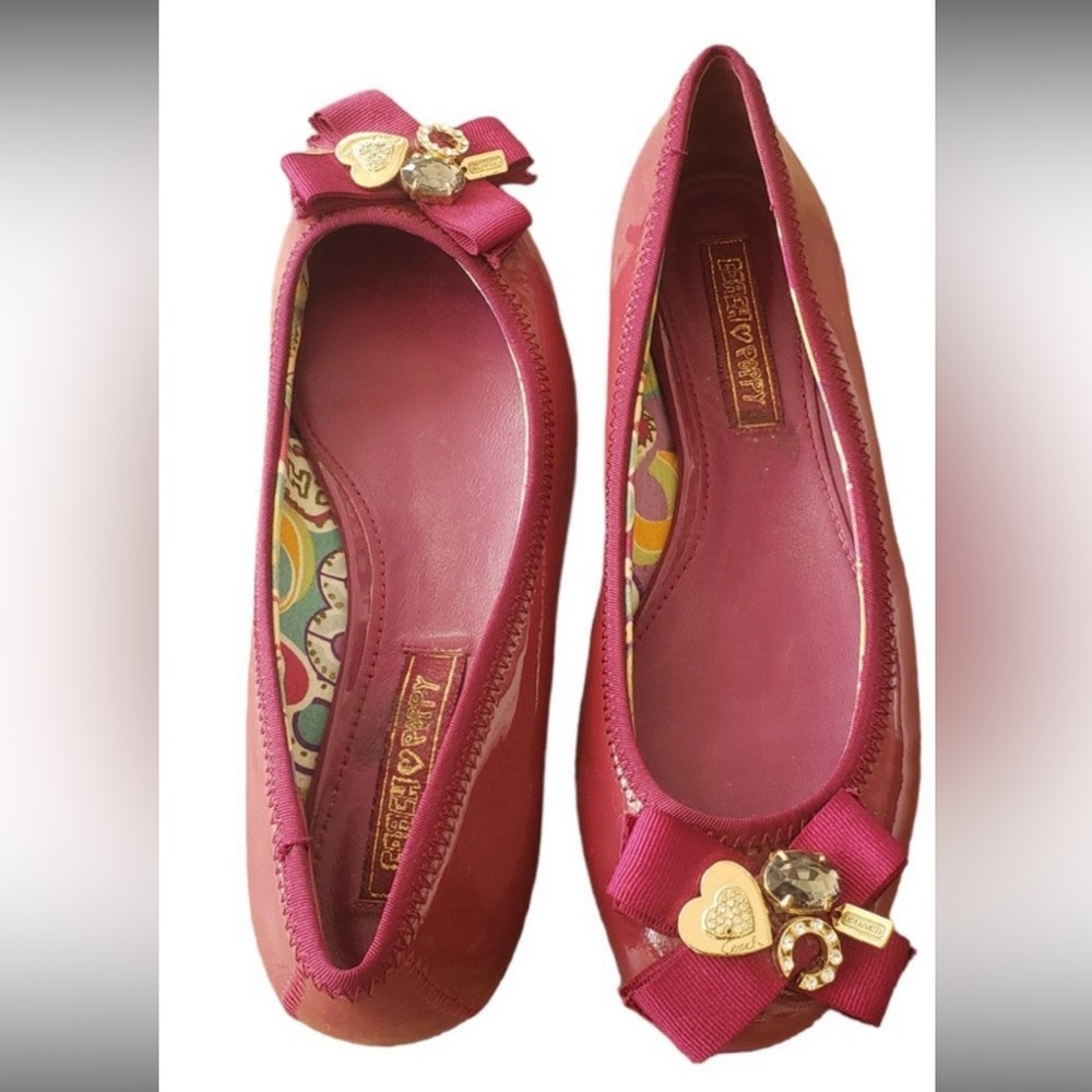 Coach Poppy Caper Purple Ballet Flats
Size 8.5